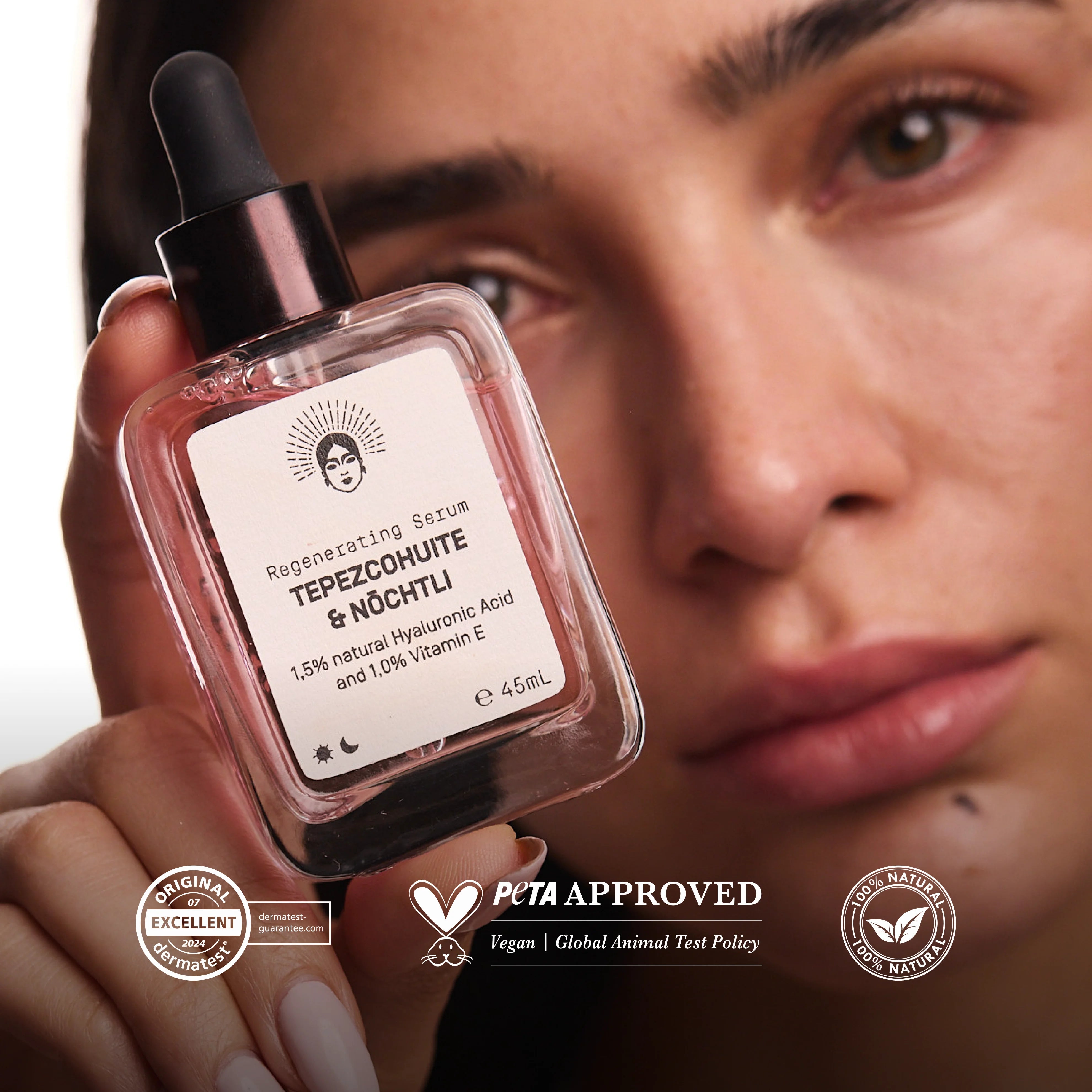 Women holding the Regenerating Serum from viva maia.
