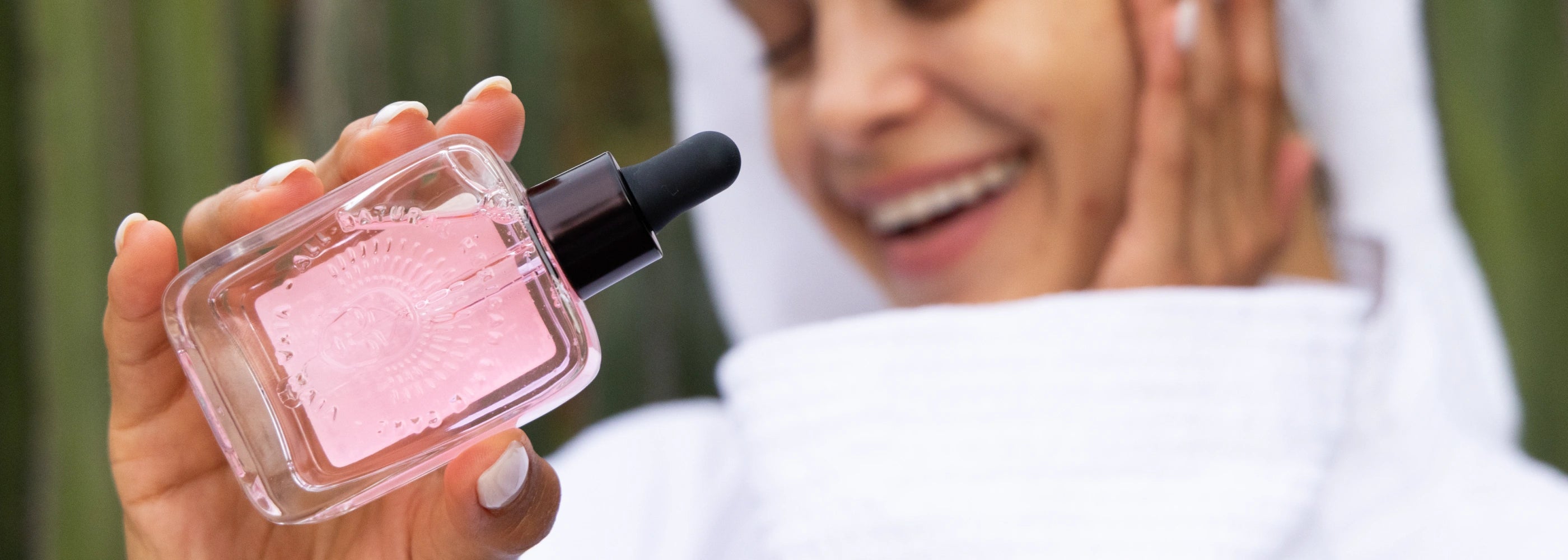 Mexican model with bottle of Regenerating Serum